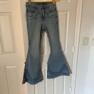 Wrangler hi rise flare jeans  featuring embroidery work on  hems- never worn